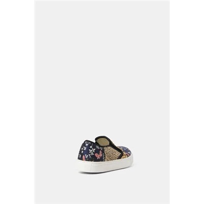 Sneakers slip on de piel