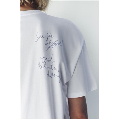 T-SHIRT WITH CONTRAST SLOGAN