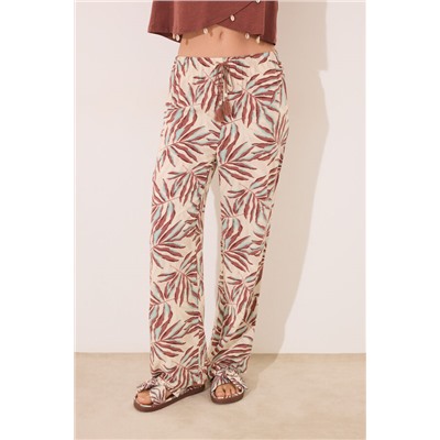 Pantalón largo estampado hojas marrón