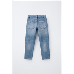 STANDARD RIPPED JEANS