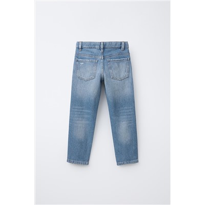 STANDARD RIPPED JEANS