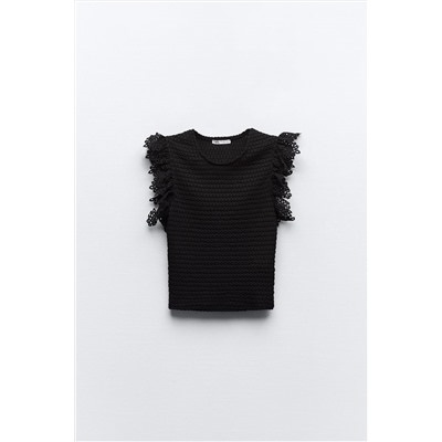 TEXTURED TOP WITH RUFFLE TRIMS