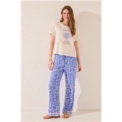 Pantalón largo estampado flores azul