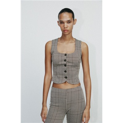 TOP CHALECO INTERLOCK