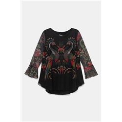 Camiseta avolantada pavos reales