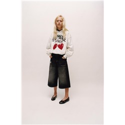 SUDADERA GLOBO CAPUCHA ESTAMPADA