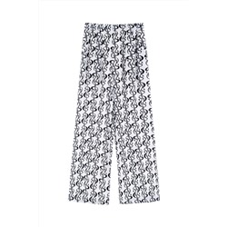 Pantalón palazzo de seda de tiro alto Blanco