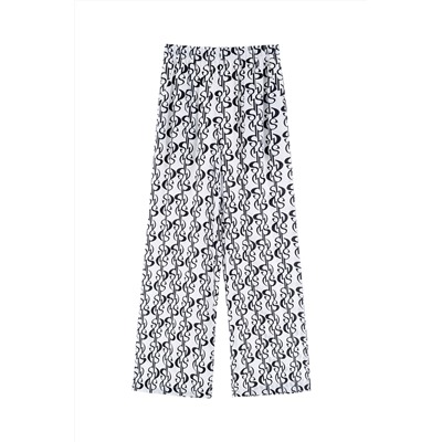 Pantalón palazzo de seda de tiro alto Blanco