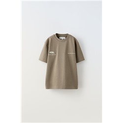 T-SHIRT WITH EMBROIDERED SLOGAN