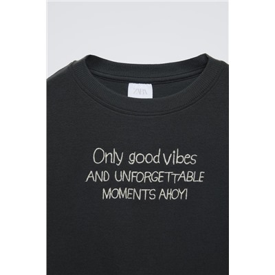 T-SHIRT WITH EMBROIDERED SLOGAN