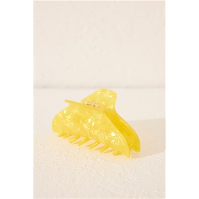 Pinza pelo efecto marmoleado amarillo