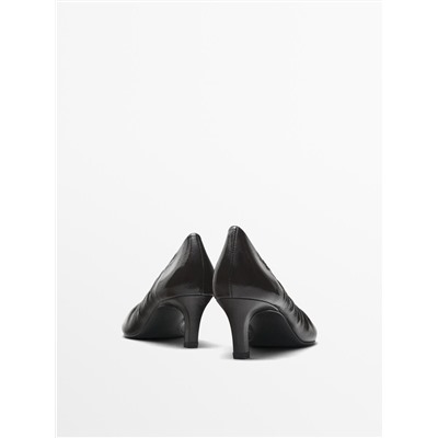 Gathered high heel shoes