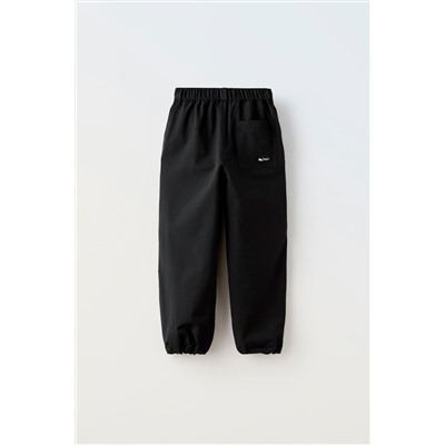 TECHNICAL PARACHUTE TROUSERS