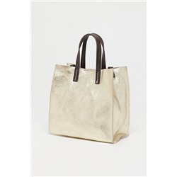 Bolso y neceser de piel Coti Dorado