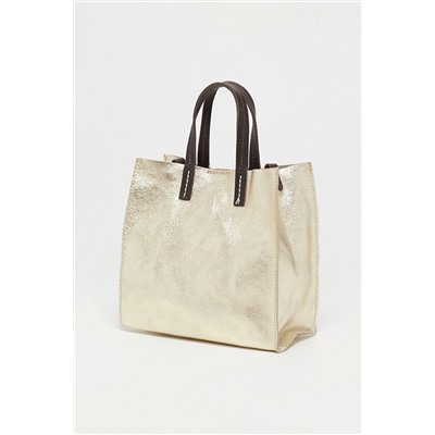 Bolso y neceser de piel Coti Dorado