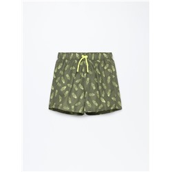 Tropical print swimming trunks
