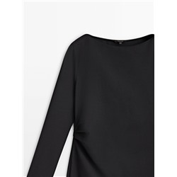 Vestido midi negro frunce lateral