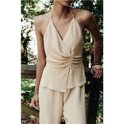 HALTER TWO-PIECE EFFECT JUMPSUIT