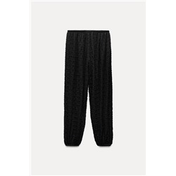 TEXTURED TROUSERS