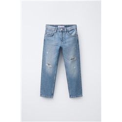 STANDARD RIPPED JEANS