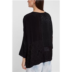 Blusa oversize transparencias