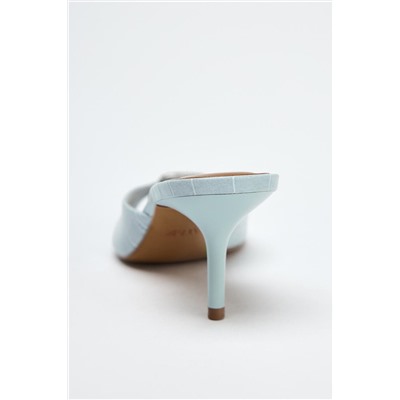TEXTURED BUCKLE HEELED MULES