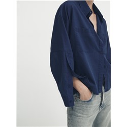 Camisa algodón bolsillos detalle mangas