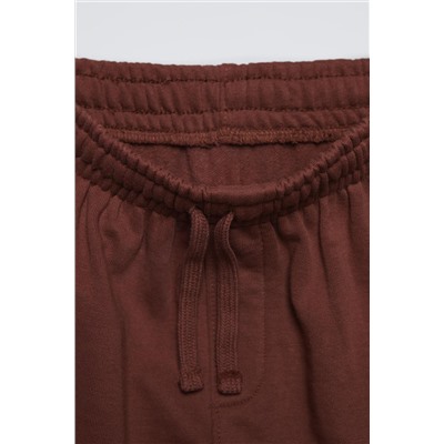 TROUSERS WITH EMBROIDERED SLOGAN