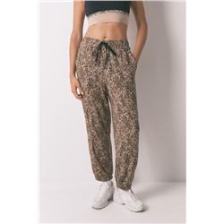 Pantalón largo carrot animal print marrón