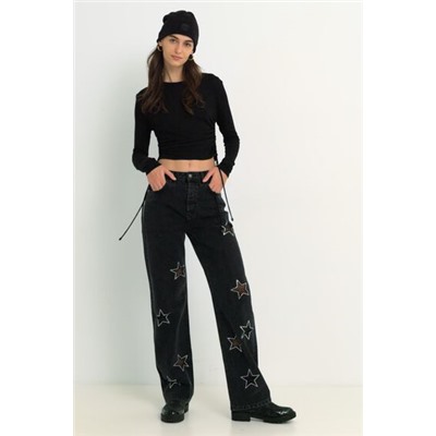 Vaqueros slim estrellas glitter