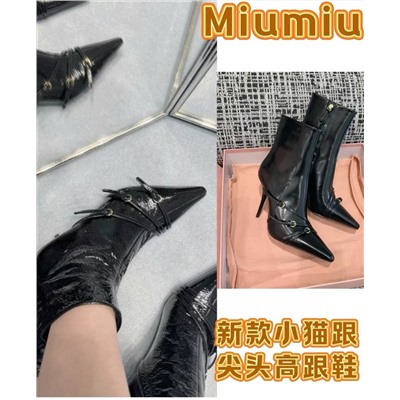 Женские полусапожки на шпильке   Mi*u Mi*u