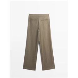 100% linen striped trousers with buckle detail