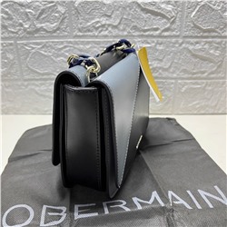 Мини-сумка немецкого бренда Obermai*n с акриловой уороткой цепочкой и длинным ремешком. Экспорт