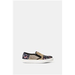 Sneakers slip on de piel
