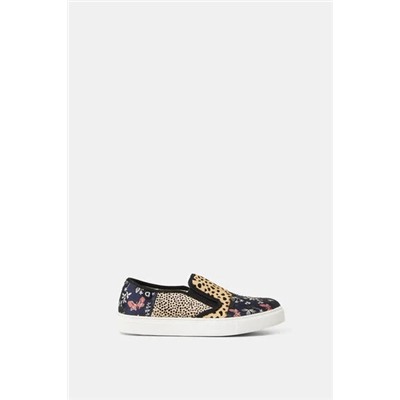 Sneakers slip on de piel