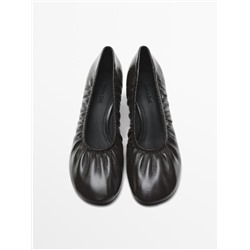 Gathered high heel shoes