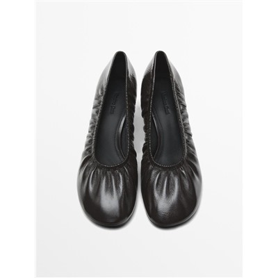 Gathered high heel shoes