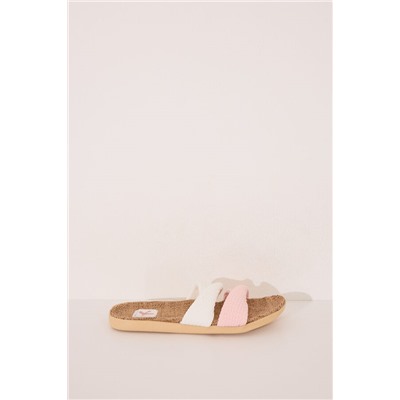 Zapatillas abiertas raffia nudos