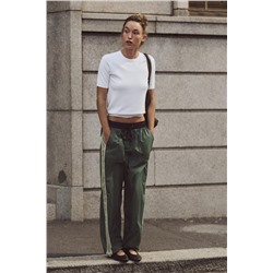 TROUSERS WITH SIDE TAPING