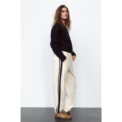 JOGGING TROUSERS WITH SLOGAN