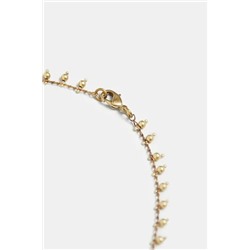 Collar largo dorado charms