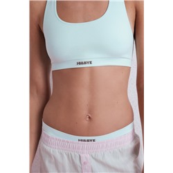 Top deportivo seamless canalé verde