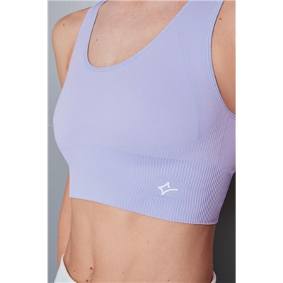 Sujetador deportivo reversible lila y blanco