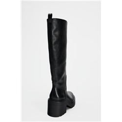 HEELED BOOTS WITH TRACK SOLES