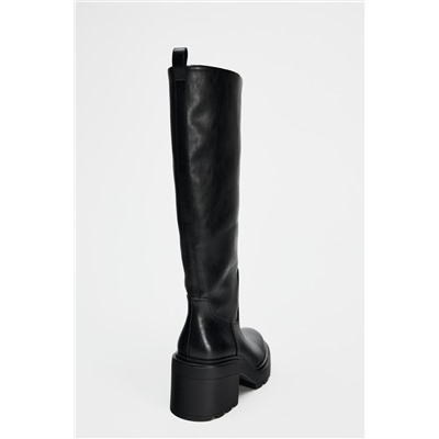 HEELED BOOTS WITH TRACK SOLES