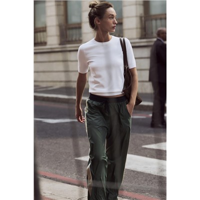 TROUSERS WITH SIDE TAPING