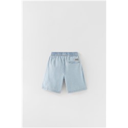 FLOWING DENIM BERMUDA SHORTS