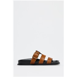 BUCKLED FLAT LEATHER SANDALS