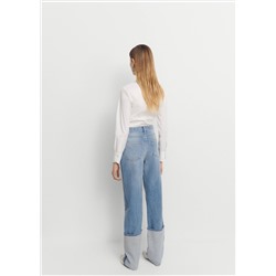 Jeans rectos bajo vuelto