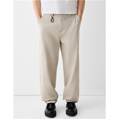 Skater-fit trousers with lobster clasp